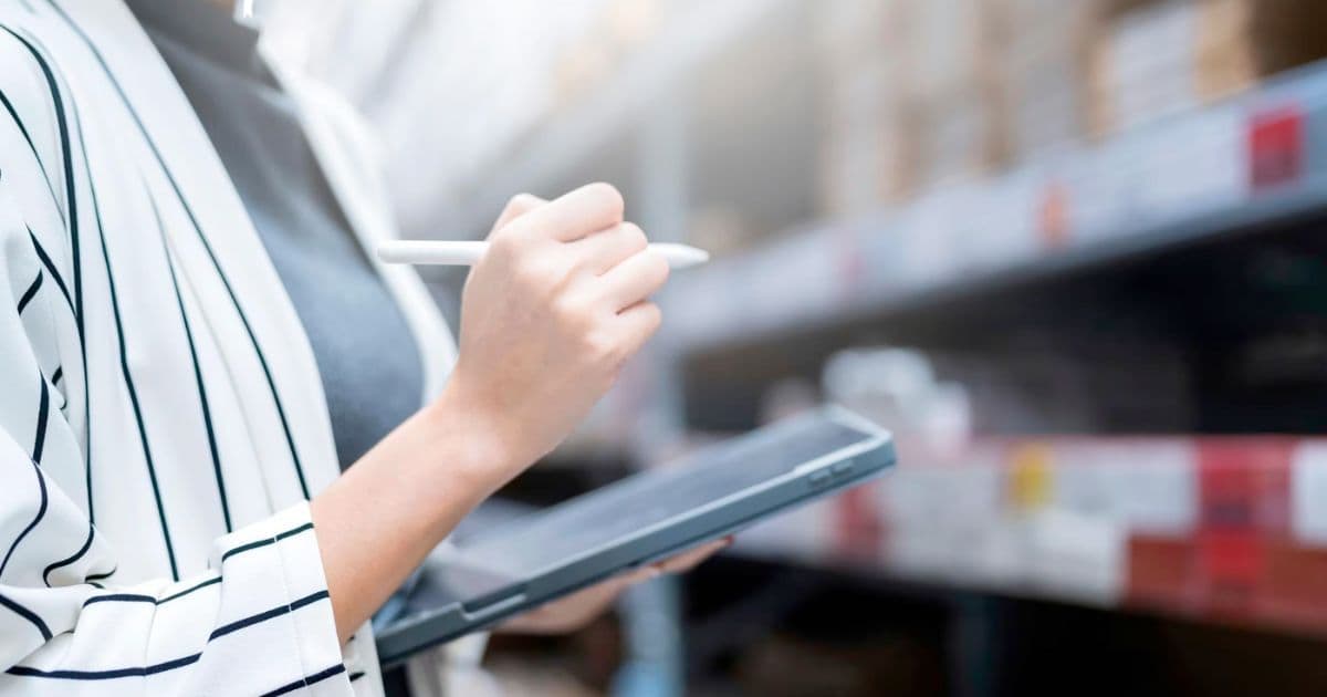 Woman managing inventory Woman managing inventory